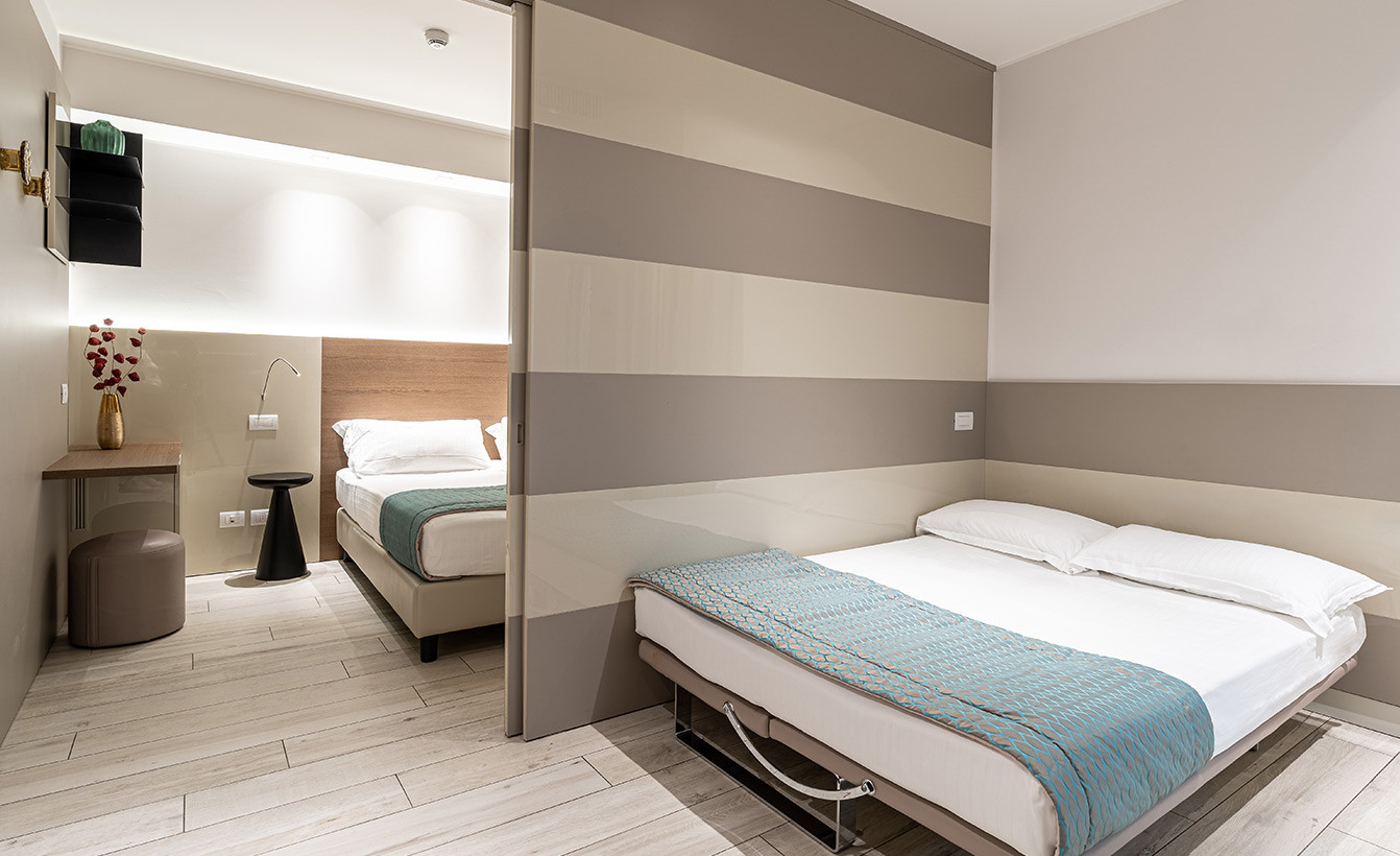 media.camere-delexu-family-1-1-hotel-savini-igea-marina